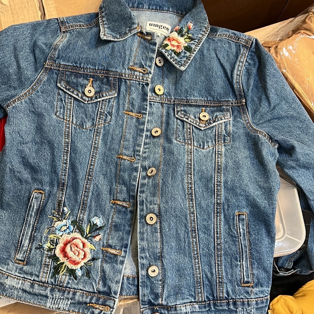 Gorgeous Umgee denim jacket with a floral embroidery front and back.